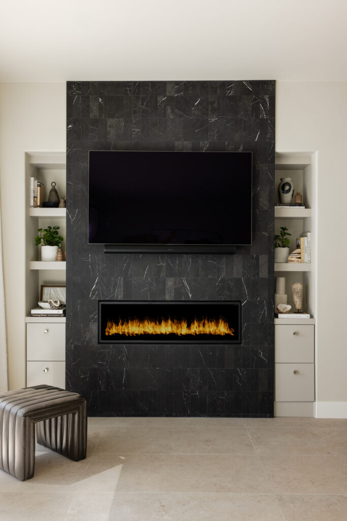 Fireplace with open shelving and storage