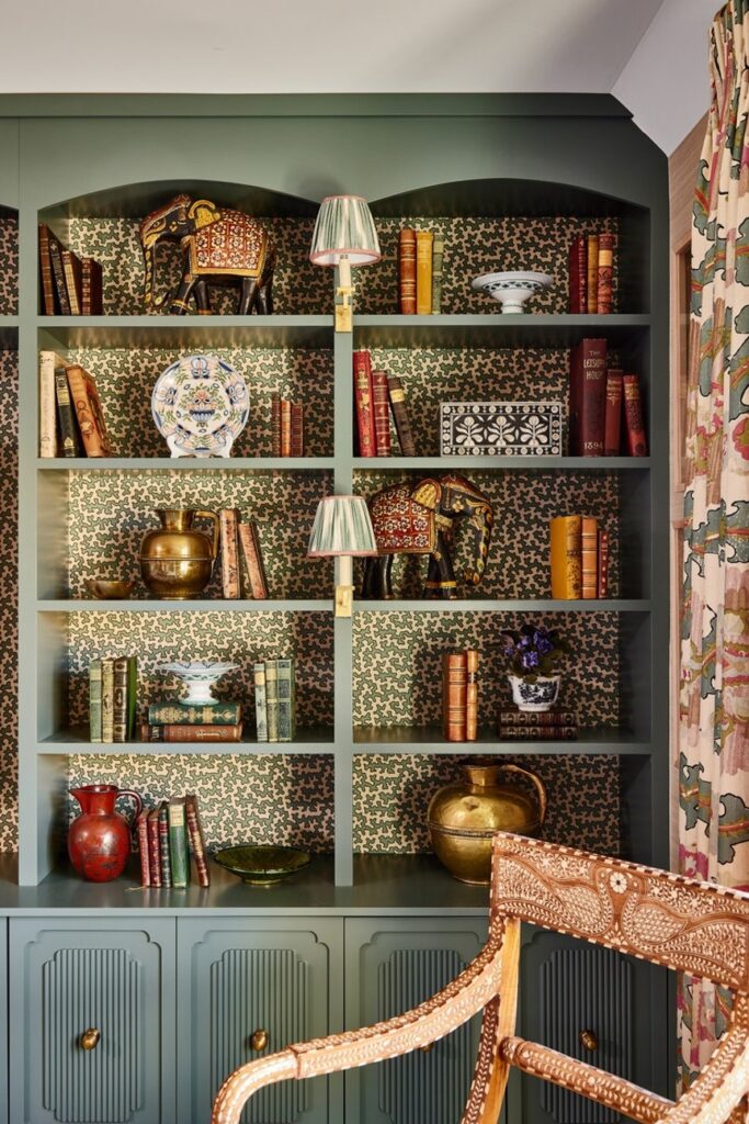 built-in bookcase with wallpaper